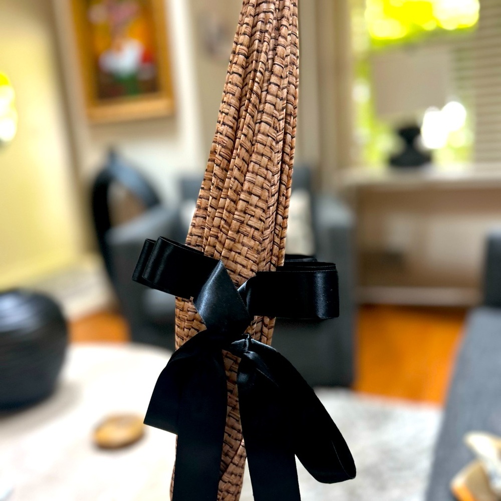 Elegant umbrella with Black Ribbon, looking like a hat very unusual!